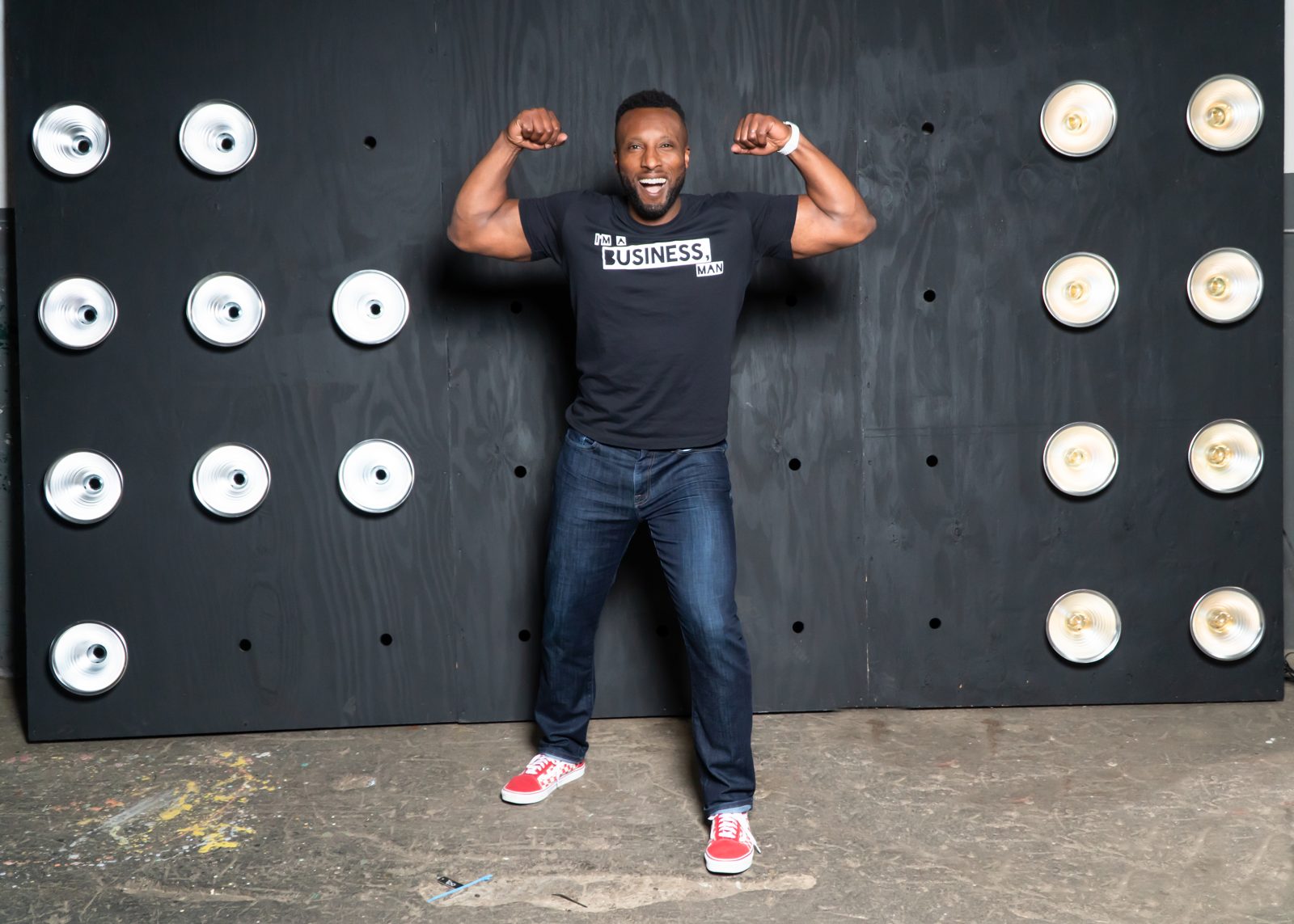 Ronnell Richards in I'm a Business Man tee, high-energy portrait